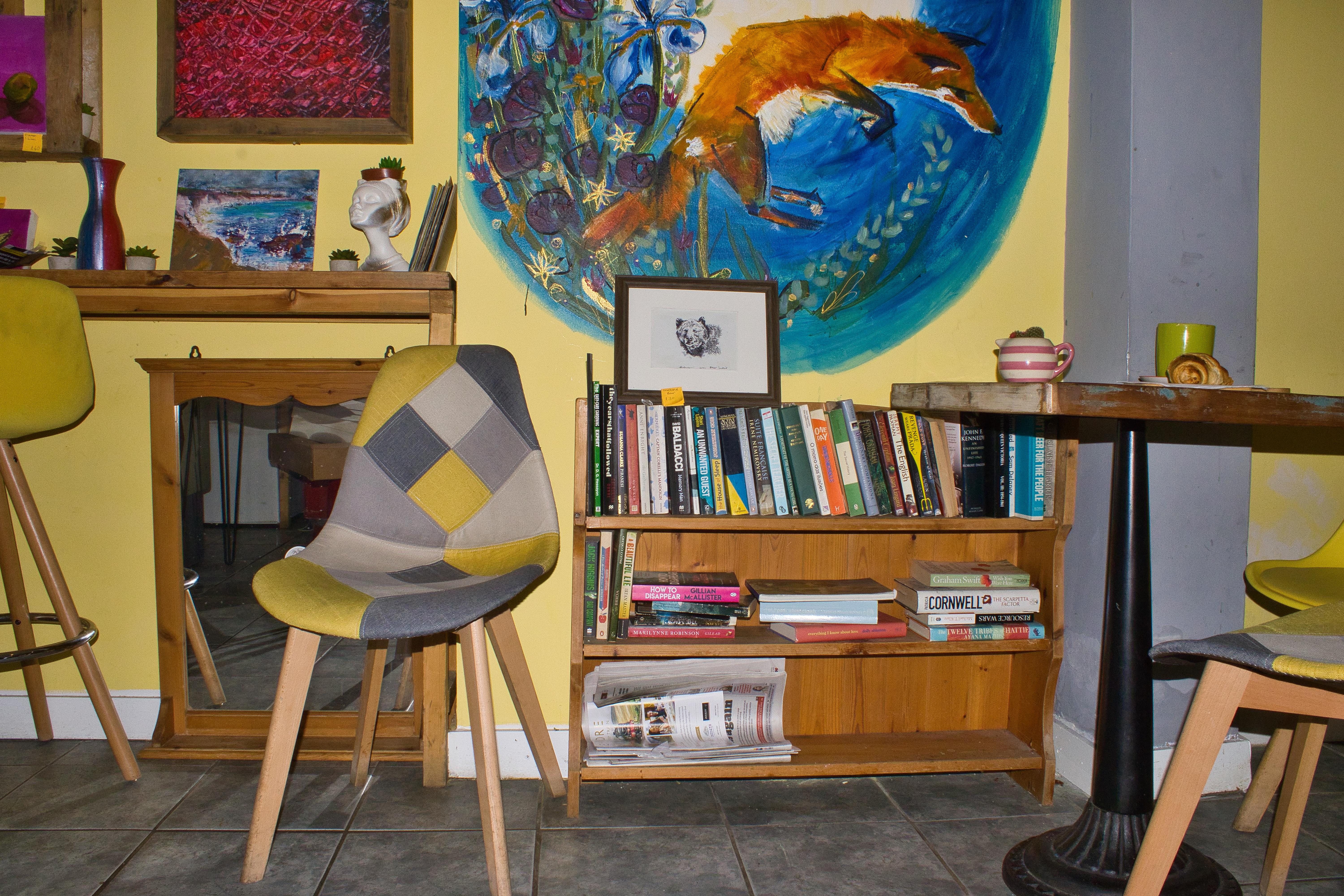 The book collection in the café.